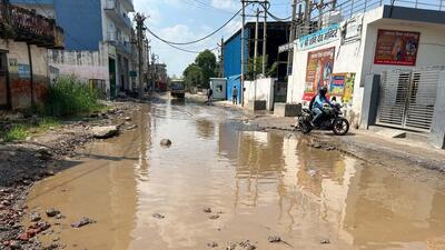 A waterlogged and damage road of Sector 84 in Ward 24. (Parveen Kumar/HT Photo) A waterlogged and damage road of Sector 84 in Ward 24. (Parveen Kumar/HT Photo)