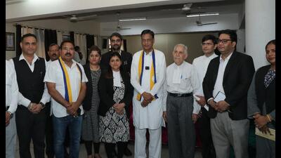 AAP candidate Prem Garg (fourth from right) during a meeting in Panchkula. (HT Photo)