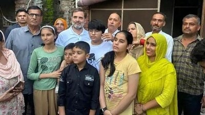 Congress leader Rahul Gandhi with family members of US-based truck driver Amit Mann at Ghogripur village in Karnal district on Friday. (HT Photo) Congress leader Rahul Gandhi with family members of US-based truck driver Amit Mann at Ghogripur village in Karnal district on Friday. (HT Photo)