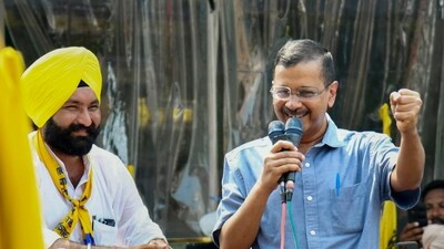 AAP chief Arvind Kejriwal addresses the crowd during a roadshow in support of party candidate Harpinder Singh. (PTI) AAP chief Arvind Kejriwal addresses the crowd during a roadshow in support of party candidate Harpinder Singh. (PTI)
