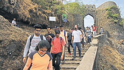 Pune, India - December 12, 2020: People enjoying at Sinhagad Fort after government gave allowed entry during the Covid-19 pandemic relaxations in Pune, India, on Saturday, December 12, 2020. (Photo by Ravindra Joshi/HT PHOTO) (Ravindra Joshi/HT Photo) Pune, India - December 12, 2020: People enjoying at Sinhagad Fort after government gave allowed entry during the Covid-19 pandemic relaxations in Pune, India, on Saturday, December 12, 2020. (Photo by Ravindra Joshi/HT PHOTO) (Ravindra Joshi/HT Photo)
