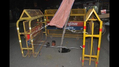 The road cave-in in front of Leela parking on Tuesday afternoon (HT Photo)