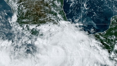 This National Oceanic and Atmospheric Administration satellite image taken at 6:10pm ET shows Hurricane John near southern Mexico on Monday, Sept. 23, 2024. (NOAA via AP) (AP) This National Oceanic and Atmospheric Administration satellite image taken at 6:10pm ET shows Hurricane John near southern Mexico on Monday, Sept. 23, 2024. (NOAA via AP) (AP)