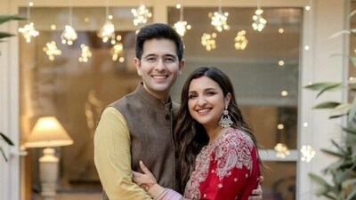 Parineeti Chopra celebrated her first karwa chauth with husband Raghav Chadha. He applied mehendi on her hands for the occasion. 