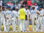 India's Ravichandran Ashwin (C) celebrates with teammates after taking five wickets during the fourth day of the first Test cricket match between India and Bangladesh at the M.A. Chidambaram Stadium in Chennai . India's Ravichandran Ashwin (C) celebrates with teammates after taking five wickets during the fourth day of the first Test cricket match between India and Bangladesh at the M.A. Chidambaram Stadium in Chennai .