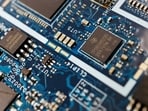 FILE PHOTO: Semiconductor chips are seen on a circuit board of a computer in this illustration picture taken February 25, 2022. REUTERS