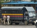 A forensic team examines the police van in which Akshay Shinde, the accused in the Badlapur sexual assault case of two minor girls, was killed in police encounter, in Thane, on September 24, 2024. 