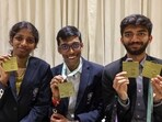 Grandmasters D Gukesh, R Praggnanandhaa and woman GM R Vaishali pose for photos at a felicitation ceremony after India won Gold medal in both open and women categories at the Chess Olympiad 2024