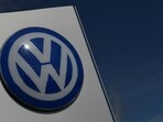 Volkswagen AG and unions negotiate cost reductions, including possible layoffs and factory closures, sparking heightened tensions. Union leaders threaten strikes if plans proceed, challenging CEO Oliver Blume as competition increases from Chinese electric vehicle makers.