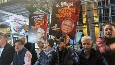 Bangladeshi nationals raise slogans during the protest against the head of Bangladesh's interim government, Mohammad Yunus, over attacks on minorities in their country, outside a hotel in New York where he was staying for attending the 79th UNGA session, on Monday. (ANI) Bangladeshi nationals raise slogans during the protest against the head of Bangladesh's interim government, Mohammad Yunus, over attacks on minorities in their country, outside a hotel in New York where he was staying for attending the 79th UNGA session, on Monday. (ANI)