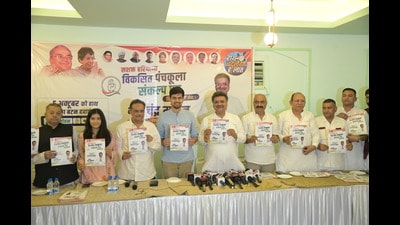Congress candidate Chander Mohan releases party’s manifesto at a private hotel in Panchkula. (HT Photo) Congress candidate Chander Mohan releases party’s manifesto at a private hotel in Panchkula. (HT Photo)