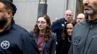 Caroline Ellison, former chief executive officer of Alameda Research LLC, center, exits court in New York, US. (Bloomberg) Caroline Ellison, former chief executive officer of Alameda Research LLC, center, exits court in New York, US. (Bloomberg)
