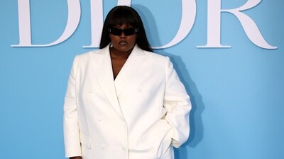 Yseult brings the boss babe glamour to the Dior show in an all-white look. She wore a notch lapel blazer with matching flared pants. She styled the look with futuristic sunglasses, loose tresses, and striking glam.&nbsp; (REUTERS)