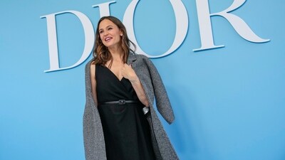 Jennifer Garner arrives for the Dior Spring/ Summer 2025 show in a black sleeveless dress featuring a V-neckline, cinched waist, and a flowy silhouette. She paired the ensemble with a grey woold jacket, minimal glam, and loose wavy locks. (AP) Jennifer Garner arrives for the Dior Spring/ Summer 2025 show in a black sleeveless dress featuring a V-neckline, cinched waist, and a flowy silhouette. She paired the ensemble with a grey woold jacket, minimal glam, and loose wavy locks. (AP)