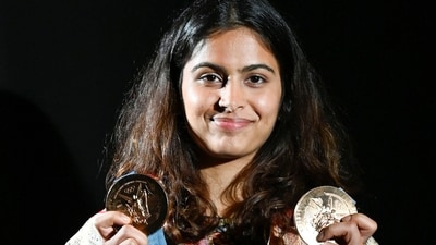 Manu Bhaker poses with her bronze medals from Paris Olympics 2024. (RAJ K RAJ /HT PHOTO) Manu Bhaker poses with her bronze medals from Paris Olympics 2024. (RAJ K RAJ /HT PHOTO)