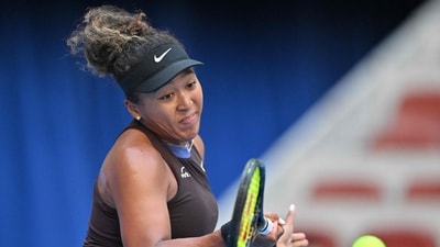 Japan's Naomi Osaka hits a return against Italy's Lucia Bronzetti during their women's singles match at the China Open tennis tournament in Beijing. (AFP) Japan's Naomi Osaka hits a return against Italy's Lucia Bronzetti during their women's singles match at the China Open tennis tournament in Beijing. (AFP)