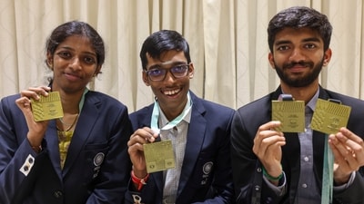 Grandmasters D Gukesh, R Praggnanandhaa and woman GM R Vaishali pose for photos at a felicitation ceremony after India won Gold medal in both open and women categories at the Chess Olympiad 2024 (PTI)