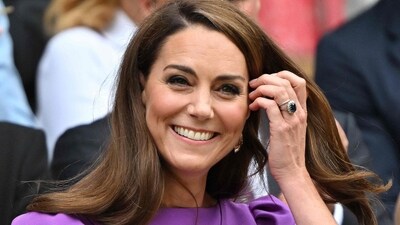 TOPSHOT - Britain's Catherine, Princess of Wales reacts as she arrives in the Royal Box on Centre Court to attend the men's singles final tennis match on the fourteenth day of the 2024 Wimbledon Championships at The All England Lawn Tennis and Croquet Club in Wimbledon, southwest London, on July 14, 2024. (Photo by ANDREJ ISAKOVIC / AFP) / RESTRICTED TO EDITORIAL USE (AFP) TOPSHOT - Britain's Catherine, Princess of Wales reacts as she arrives in the Royal Box on Centre Court to attend the men's singles final tennis match on the fourteenth day of the 2024 Wimbledon Championships at The All England Lawn Tennis and Croquet Club in Wimbledon, southwest London, on July 14, 2024. (Photo by ANDREJ ISAKOVIC / AFP) / RESTRICTED TO EDITORIAL USE (AFP)