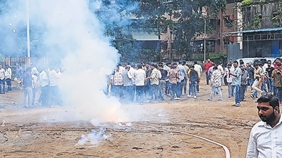 Thane, India - September 24, 2024: Badlapur minor girls abuse case accused Akshay Shinde died in police encounter in Thane ,shivsainik of ShivSena's Shinde group celebrated by bursting firecrackers at Thane ,in Thane,in Mumbai, India, on, Tuesday, September 24, 2024. ( Praful Gangurde /HT Photo ) Thane, India - September 24, 2024: Badlapur minor girls abuse case accused Akshay Shinde died in police encounter in Thane ,shivsainik of ShivSena's Shinde group celebrated by bursting firecrackers at Thane ,in Thane,in Mumbai, India, on, Tuesday, September 24, 2024. ( Praful Gangurde /HT Photo )