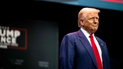 Republican presidential nominee, former U.S. President Donald Trump arrives during a campaign rally at the Johnny Mercer Theatre on September 24, 2024 in Savannah, Georgia. (Photo by Brandon Bell / GETTY IMAGES NORTH AMERICA / Getty Images via AFP) (Getty Images via AFP)