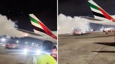 In the video, filmed by ground workers from the tarmac, plumes of white smoke can be seen coming out of the plane's tail. (X/ @FlightModeblog) In the video, filmed by ground workers from the tarmac, plumes of white smoke can be seen coming out of the plane's tail. (X/ @FlightModeblog)
