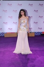 Mouni Roy poses for the paparazzi.