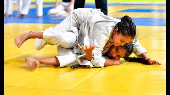 Judo players during their bout at Khedan Watan Punjab Diyan in Ludhiana on Wednesday. (Manish/Hindustan Times)