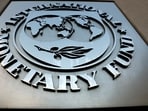 The International Monetary Fund (IMF) logo is seen outside the headquarters building in Washington.