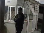 The video posted on X, shows a scuffle between a resident and a security guard.