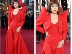 Lady Gaga embraced the red carpet moment in a dramatic, red gown. Lady Gaga embraced the red carpet moment in a dramatic, red gown.