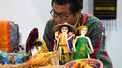 A visitor checks out the handicraft items displayed at the second edition of Uttar Pradesh International Trade Show 2024, underway at India Expo Mart in Greater Noida. (Sunil Ghosh/HT Photo) A visitor checks out the handicraft items displayed at the second edition of Uttar Pradesh International Trade Show 2024, underway at India Expo Mart in Greater Noida. (Sunil Ghosh/HT Photo)