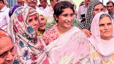 Jind, Sep 25 (ANI): Congress candidate from the Julana assembly constituency Vinesh Phogat during an election campaign ahead of the Haryana Assembly elections, at Anoopgarh Village in Jind on Wednesday. (ANI Photo) Jind, Sep 25 (ANI): Congress candidate from the Julana assembly constituency Vinesh Phogat during an election campaign ahead of the Haryana Assembly elections, at Anoopgarh Village in Jind on Wednesday. (ANI Photo)