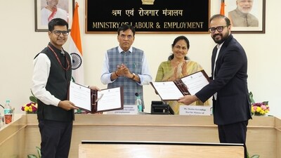 Amit Nirmal, DDG (Employment), Ministry of Labour & Employment and Aman Jain, Director, Public Policy, Amazon exchanging the MoU.JPG