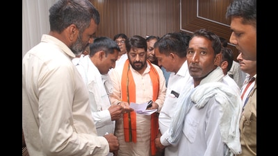 Haryana Lokhit Party candidate Gopal Kanda with workers at his party office in Sirsa on Tuesday. (Sanjeev Kumar / HT) Haryana Lokhit Party candidate Gopal Kanda with workers at his party office in Sirsa on Tuesday. (Sanjeev Kumar / HT)