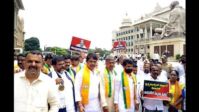 Leader of Opposition in Karnataka Assembly R Ashoka, BJP MLC CT Ravi and others stage a protest against Karnataka Chief Minister Siddaramaiah, in front of Vidhan Soudha in Bengaluru on Thursday. (Arunkumar Rao) Leader of Opposition in Karnataka Assembly R Ashoka, BJP MLC CT Ravi and others stage a protest against Karnataka Chief Minister Siddaramaiah, in front of Vidhan Soudha in Bengaluru on Thursday. (Arunkumar Rao)