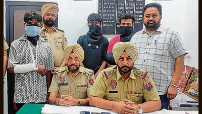The police with the arrested accused in Ludhiana on Thursday. (HT Photo) The police with the arrested accused in Ludhiana on Thursday. (HT Photo)