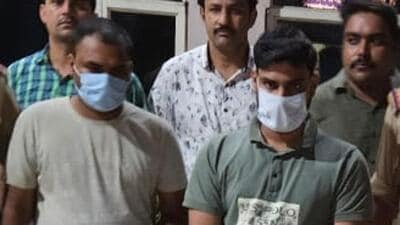 The two suspects in police custody on Thursday. (HT Photo) The two suspects in police custody on Thursday. (HT Photo)