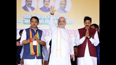 Union home Amit Shah waves to the supporters during an election rally for the Jammu and Kashmir elections. (ANI) Union home Amit Shah waves to the supporters during an election rally for the Jammu and Kashmir elections. (ANI)