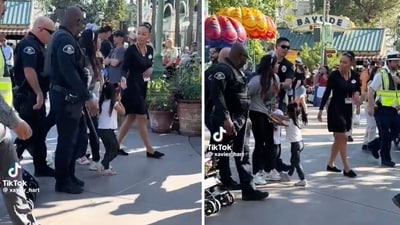 A video showing the woman being dragged out of Disneyland while her daughters cling to her and cry has gone viral on social media. (X/disneyscoopguy) A video showing the woman being dragged out of Disneyland while her daughters cling to her and cry has gone viral on social media. (X/disneyscoopguy)