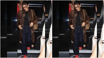 Hailey Bieber's latest date night look with Justin Bieber was effortlessly chic. She rocked a basic black t-shirt paired with a stylish animal print long coat and baggy dark blue denim. With a matching bag, red shoes, and transparent glasses, she nailed the stylishly cool vibe. (Instagram/@JustJared) Hailey Bieber's latest date night look with Justin Bieber was effortlessly chic. She rocked a basic black t-shirt paired with a stylish animal print long coat and baggy dark blue denim. With a matching bag, red shoes, and transparent glasses, she nailed the stylishly cool vibe. (Instagram/@JustJared)