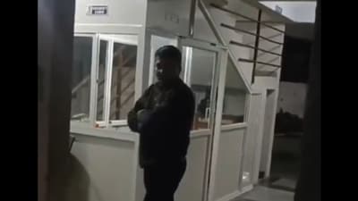 The video posted on X, shows a scuffle between a resident and a security guard. (X) The video posted on X, shows a scuffle between a resident and a security guard. (X)