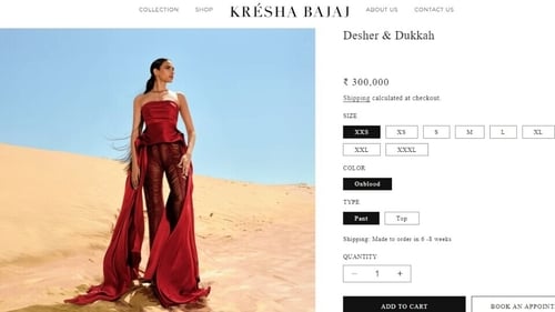 The red ensemble is worth ₹3 lakh. (kreshabajaj.com) The red ensemble is worth ₹3 lakh. (kreshabajaj.com)