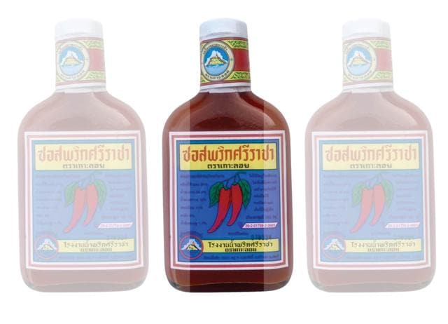 Many Thai companies are now bottling their own Sriracha sauces. Many Thai companies are now bottling their own Sriracha sauces.