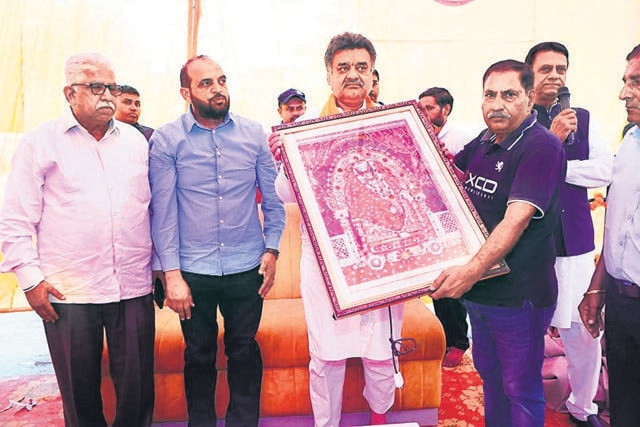 Congress candidate Chander Mohan during an event in Sector 16, Panchkula. (Sant Arora/Hindustan Times)