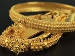 Gold and silver prices dipped on Friday, yet both are on track for weekly gains. Silver reached a 10-year high earlier, with analysts predicting continued strength for gold due to potential Fed rate cuts and global tensions.