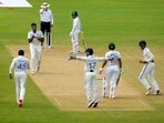 Indian bowler Ravichandran Ashwin celebrates the wicket of Bangladesh captain Najmul Hossain Shanto.
