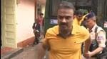 Two persons, identified as Rajat Bhattacharya and Giridhari Roy, were arrested on the charge of harassment, intimidation and assault on two persons from Bihar. (ANI/Screengrab)