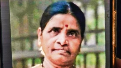 45-year-old Vimal Gaikwad lost her life after falling into an overflowing nullah in the MIDC area of Andheri during heavy rains in Mumbai. (Raju Shinde/HT Photo) 45-year-old Vimal Gaikwad lost her life after falling into an overflowing nullah in the MIDC area of Andheri during heavy rains in Mumbai. (Raju Shinde/HT Photo)