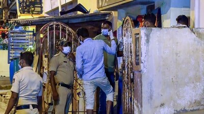 Police personnel investigate after the dead body of a woman, cut into pieces, was found stored in a refrigerator, at Vyalikaval in Bengaluru on Saturday. (ANI Photo) (ANI) Police personnel investigate after the dead body of a woman, cut into pieces, was found stored in a refrigerator, at Vyalikaval in Bengaluru on Saturday. (ANI Photo) (ANI)