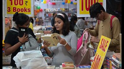 Book lovers on the first day of National Book fair at Moti Mahal Lawns in Lucknow on Friday. (Mushtaq Ali/HT Photo) Book lovers on the first day of National Book fair at Moti Mahal Lawns in Lucknow on Friday. (Mushtaq Ali/HT Photo)